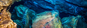 Light through ancient underwater lava formations in Hawaii