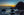 Lost and Found fine art print of a golden sunset over a volcanic Costa Rica shoreline with tide-pool rocks