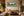 Alma De La Selva panoramic fine art print framed on the wall of a warm, luxury Costa Rican-style living room