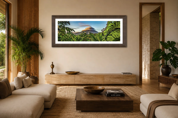 Alma De La Selva panoramic fine art print framed on the wall of a warm, luxury Costa Rican-style living room
