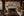 Cliffs of Moher Ireland panoramic fine art print framed above a fireplace mantel in a refined European country-manor living room