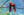 Two scarlet macaws perched side by side