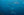 Current Flow fine art print — a school of yellowfin tuna drifting through calm deep-blue open ocean