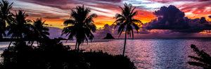 A vivid tropical sunset over the Hawaiian Islands