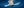 Follow the Current — an olive ridley sea turtle drifting toward the camera with outstretched flippers just below the sunlit surface of the open Pacific, fine art panoramic underwater photograph