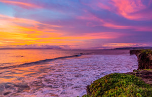 Pacific Afterglow fine art print of a vivid pink and orange sunset over the Pacific Ocean with a cliffside coastline