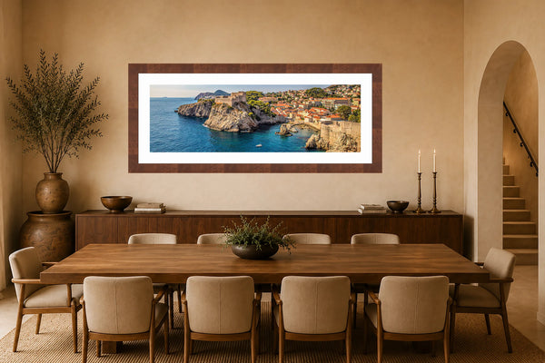 King's Landing panoramic Dubrovnik Croatia coastline fine art print framed above a long walnut credenza in an elegant Mediterranean-inspired luxury dining room
