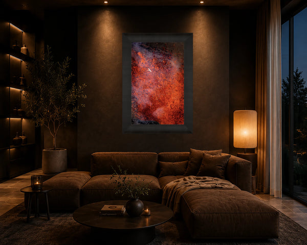 Spirit of Kilauea fiery volcano fine art print framed on a dark plaster wall in a moody modern lounge