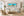 Tranquil Tides sea turtle panorama framed above a sofa in a bright relaxed coastal living room